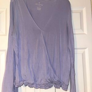 Long sleeve flared at bottom, v neck cross top